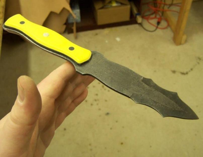 كيفية موازنة سكين الرمي بشكل صحيح.  فن رمي السكين .  صعوبة رمي سكين القتال